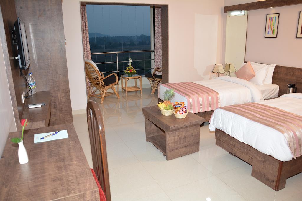 Boshan Hotels Mapusa Quarto foto