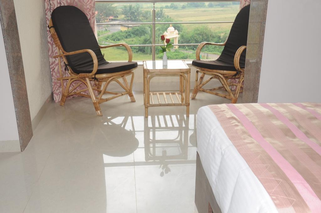 Boshan Hotels Mapusa Quarto foto