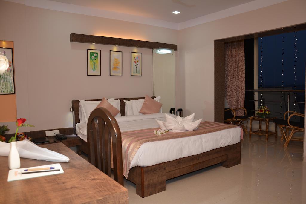 Boshan Hotels Mapusa Quarto foto